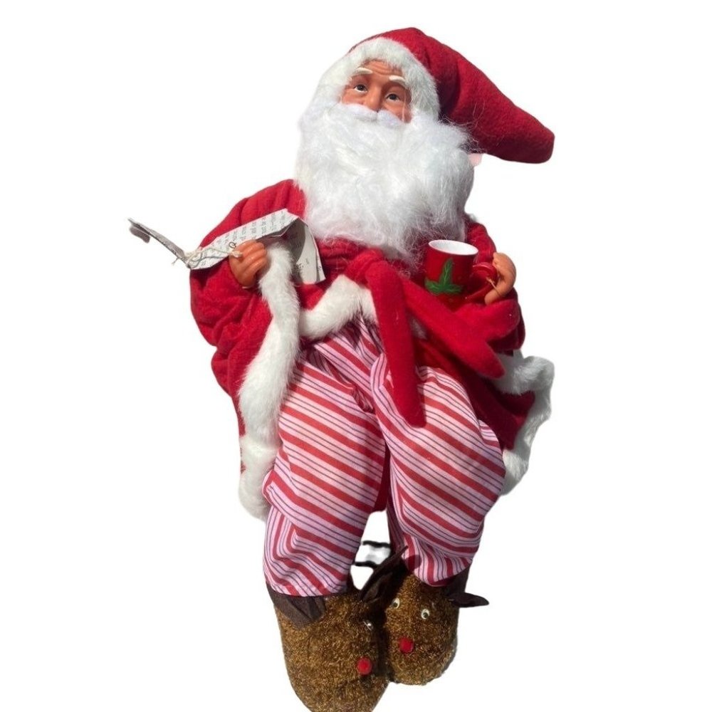 Santa North Pole trading co sitting with cup of coffee large